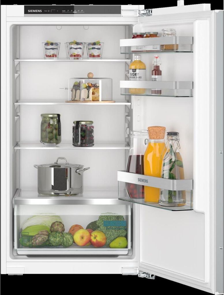 An open refrigerator with food items on the shelves.
