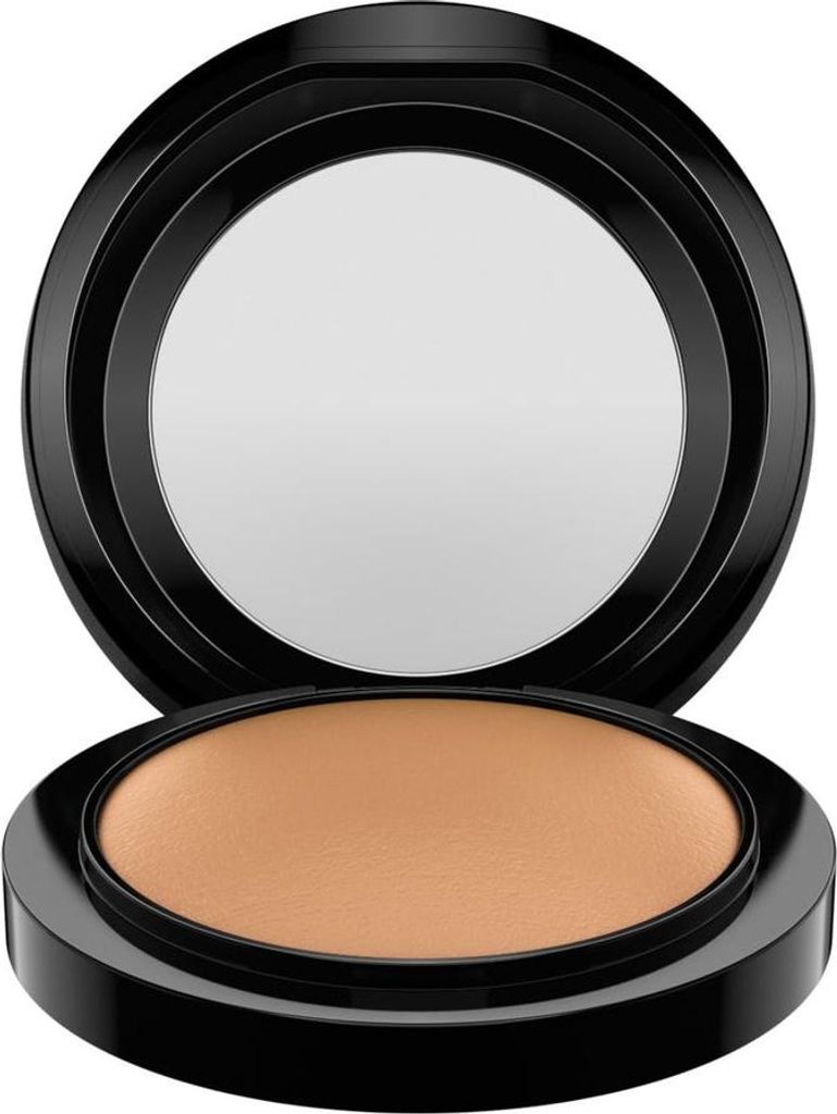 A close-up studio shot of an open compact of MAC Mineralize Skinfinish Natural.