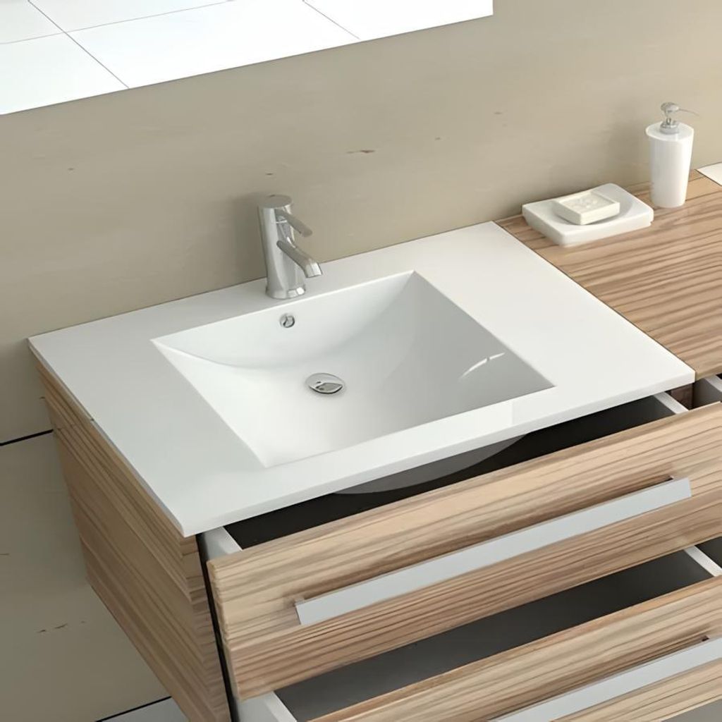 A bathroom vanity with a sink and faucet.