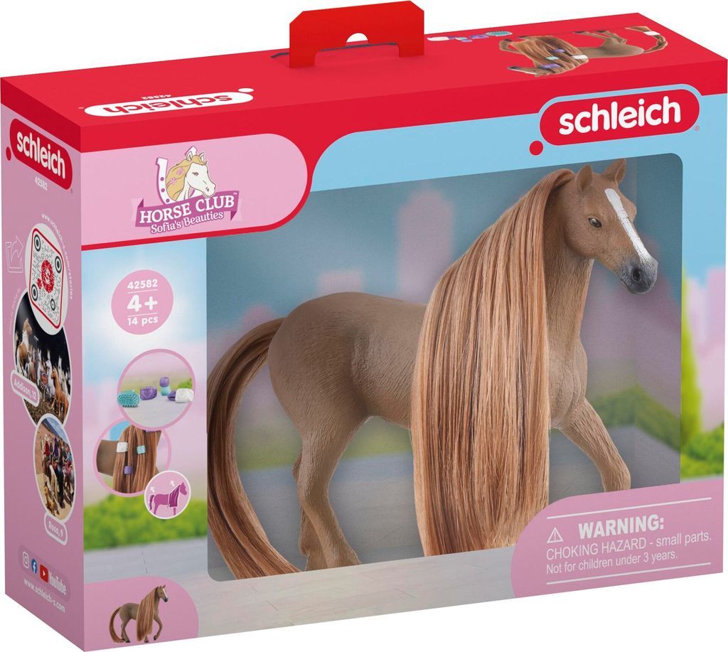 A toy horse in its packaging, with various accessories shown on the side.