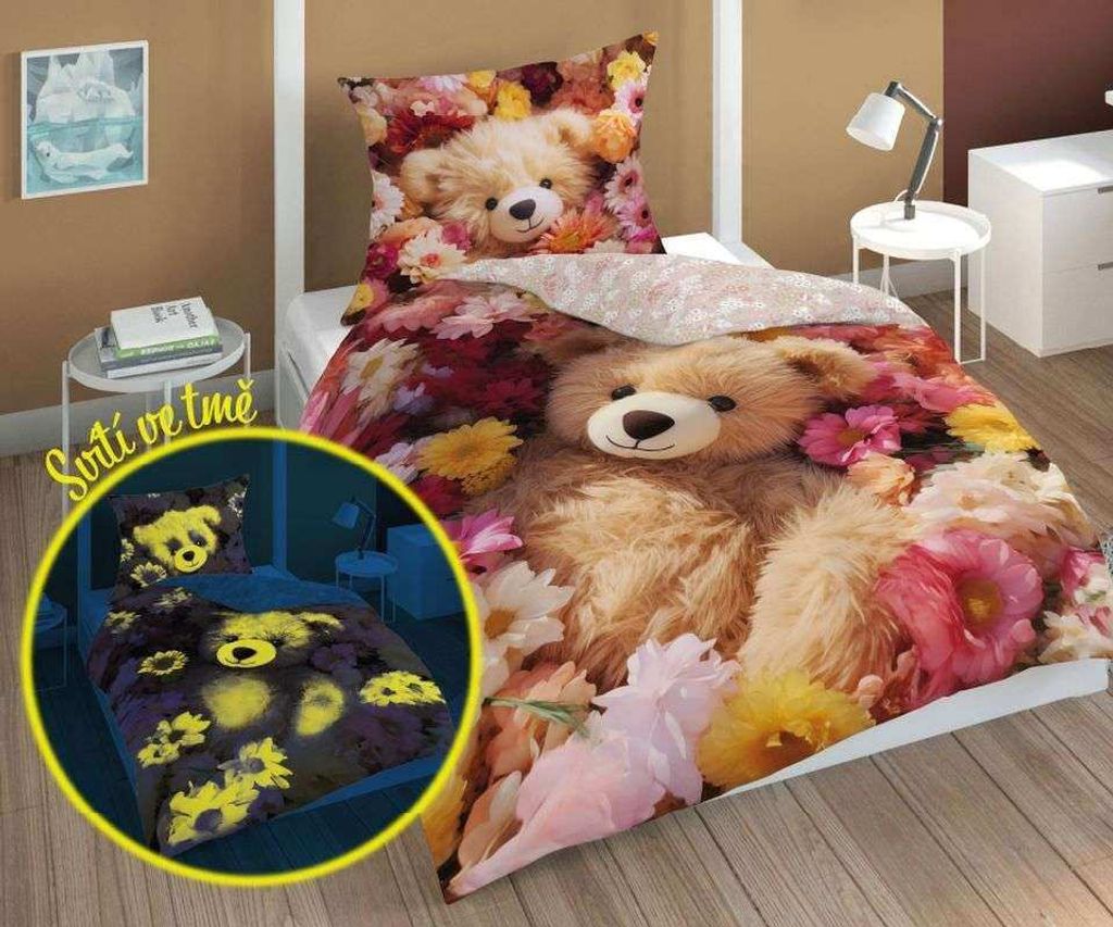 A bed with bedding featuring a teddy bear and flowers, with a smaller inset showing the bedding glowing in the dark.