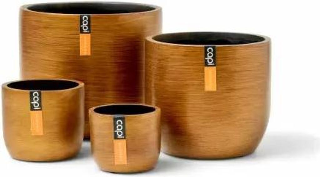 Four planters of varying sizes are arranged on a white background.