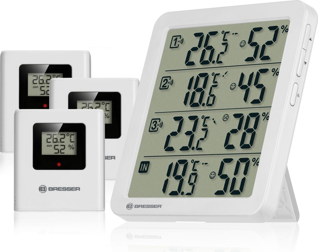 A white digital thermometer and hygrometer set with multiple sensors, displayed on a white background.
