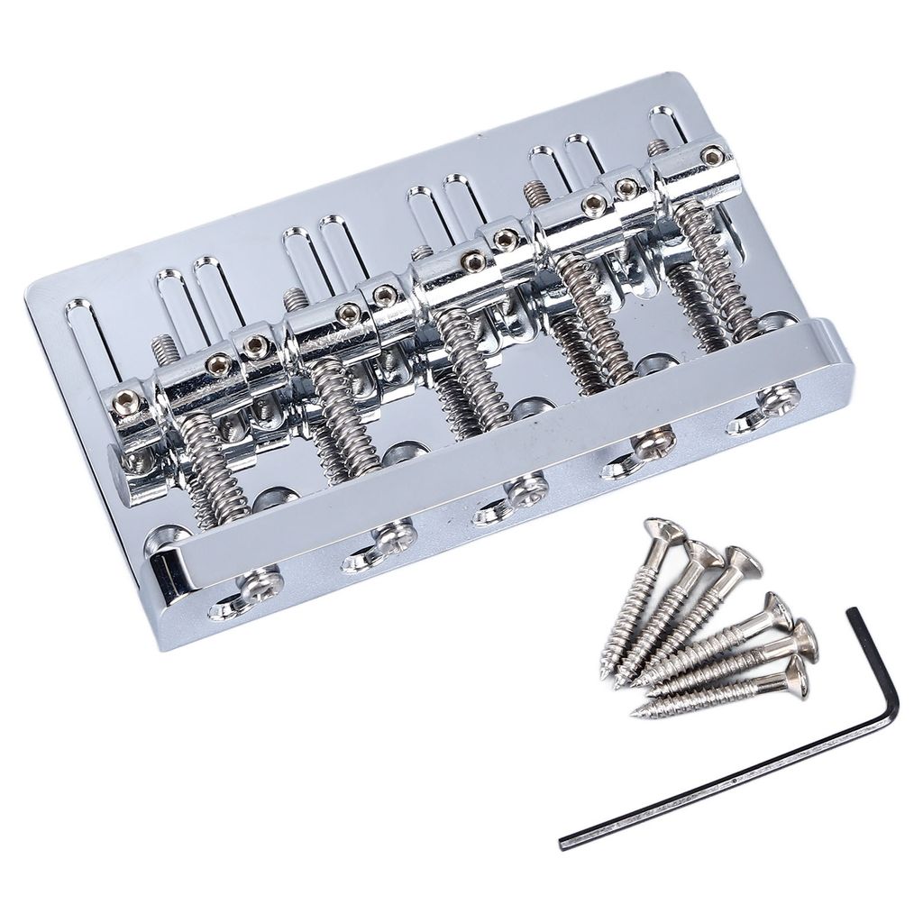 A chrome-finished 5-string bass guitar bridge with included screws and an Allen wrench, displayed on a white background.