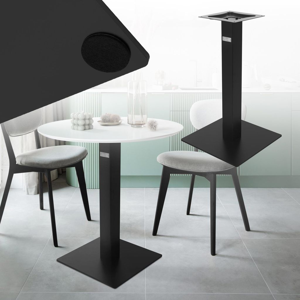 A black table base is shown in a modern dining room setting with a white table and chairs.