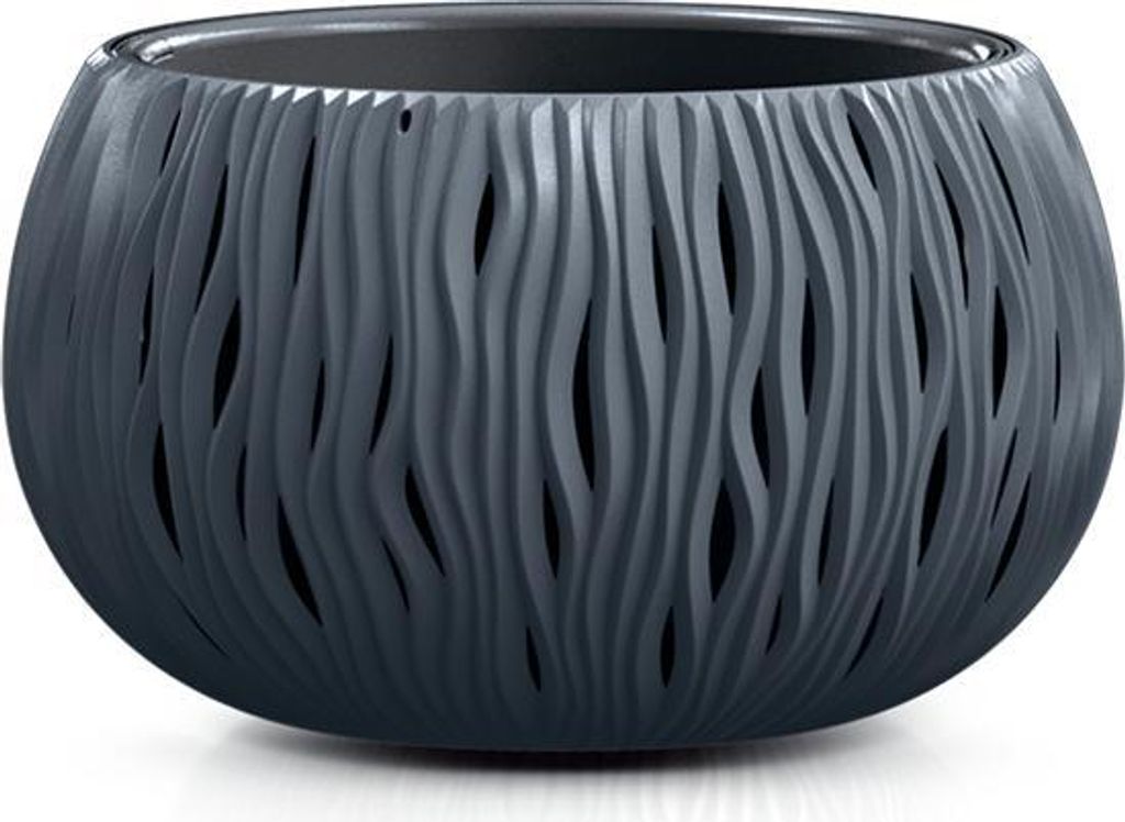 A dark gray, round planter with a wavy, cut-out pattern.