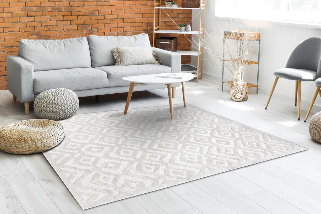 Tapis de salon beige aspect sisal tissé plat avec motifs géométriques