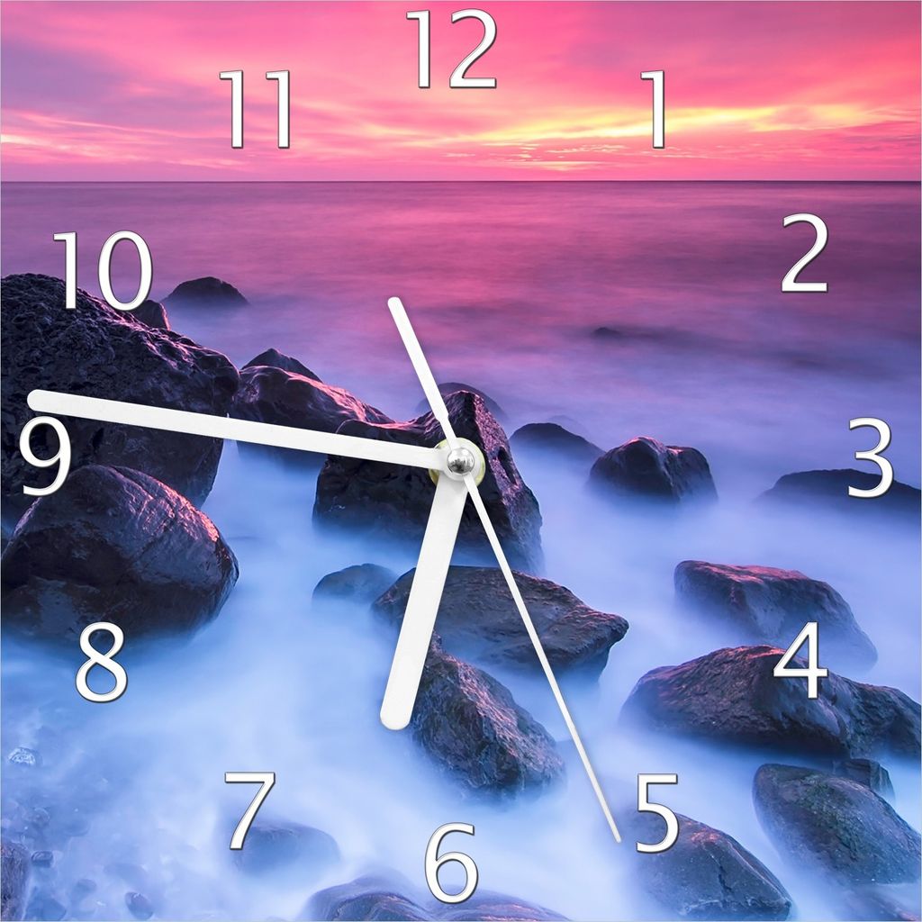 Wallario Design Wanduhr Felsen im Meer bei Sonnenuntergang aus Echtglas, Größe 20 x 20 cm
