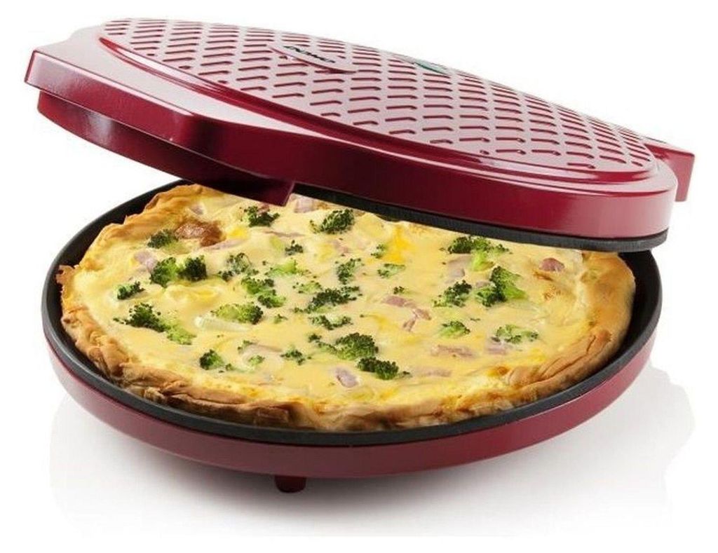 A red pizza maker with a quiche inside.