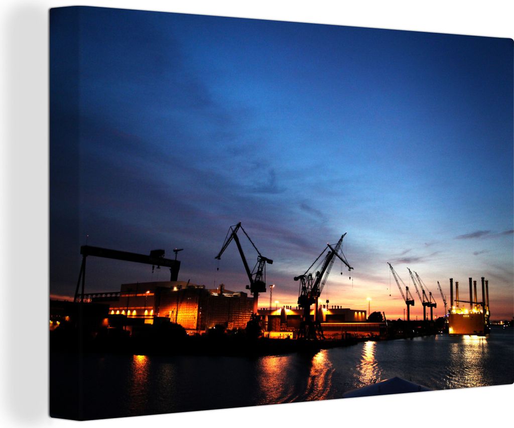 OneMillionCanvasses - Leinwandbilder - 140x90 cm, Kräne im Hafen der deutschen Stadt Rostock, Wandbilder Kunstdruck Wanddekoration - Foto auf Le...