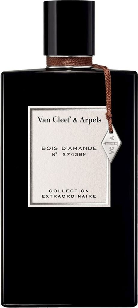 A black bottle of perfume with a white label and a brown string attached to a small metal tag.