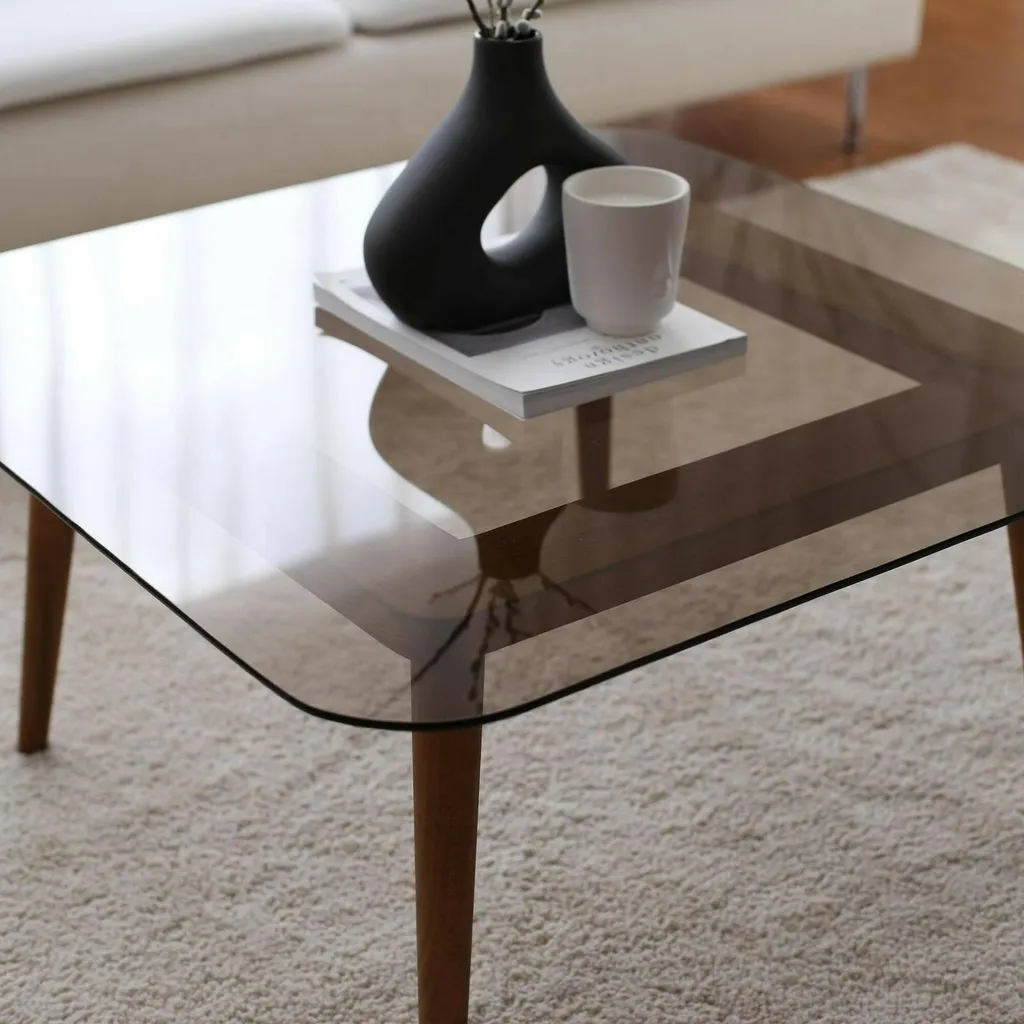 Table basse effet fumé Mezzagno structure bronze marron robuste