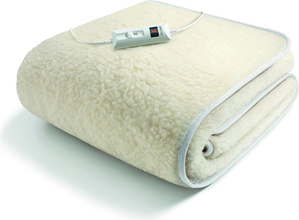 A folded electric blanket on a white background.
