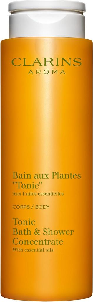 A close-up shot of a Clarins bath and shower concentrate bottle.