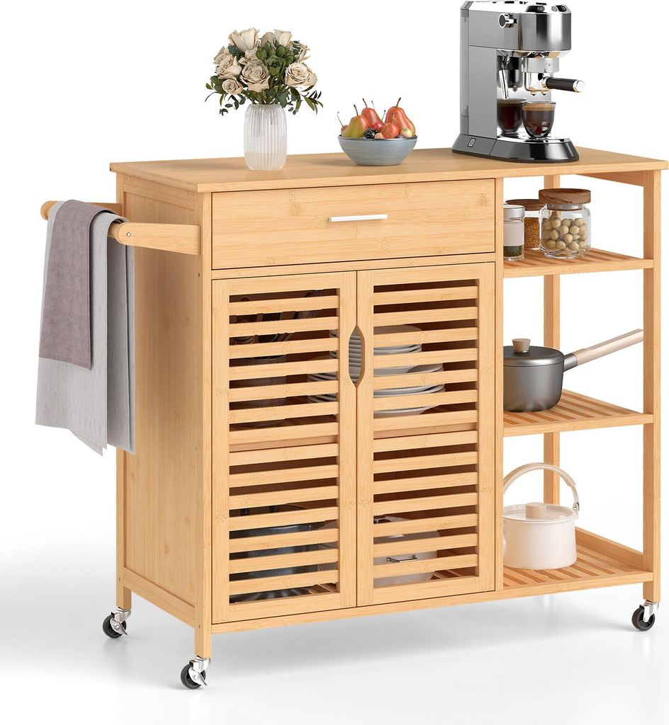 A kitchen island cart made of wood, with a coffee maker, fruit bowl, and flowers on top. It has storage cabinets and shelves, and a towel rack on the side. The cart is on wheels.