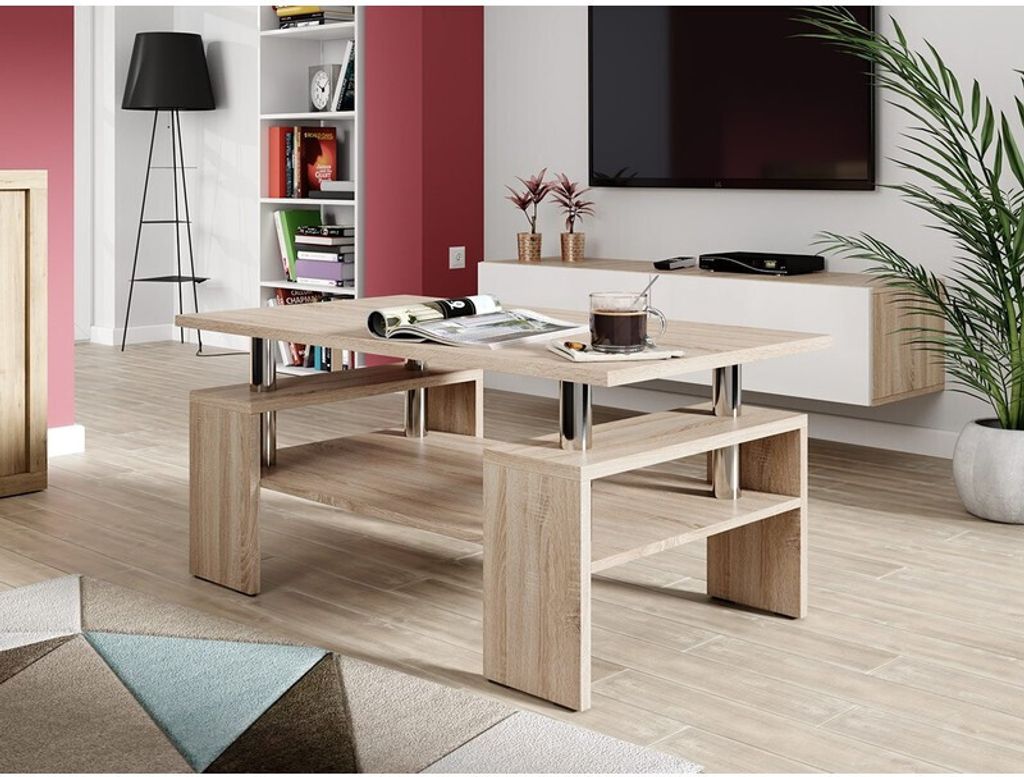 A modern living room with a coffee table, TV, and plant.