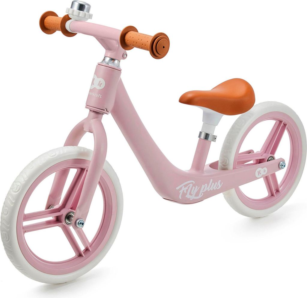 A pink balance bike with orange handlebars and seat is shown against a white background.