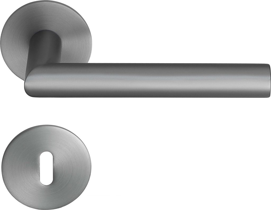 A door handle set with a round escutcheon plate, both made of brushed metal.