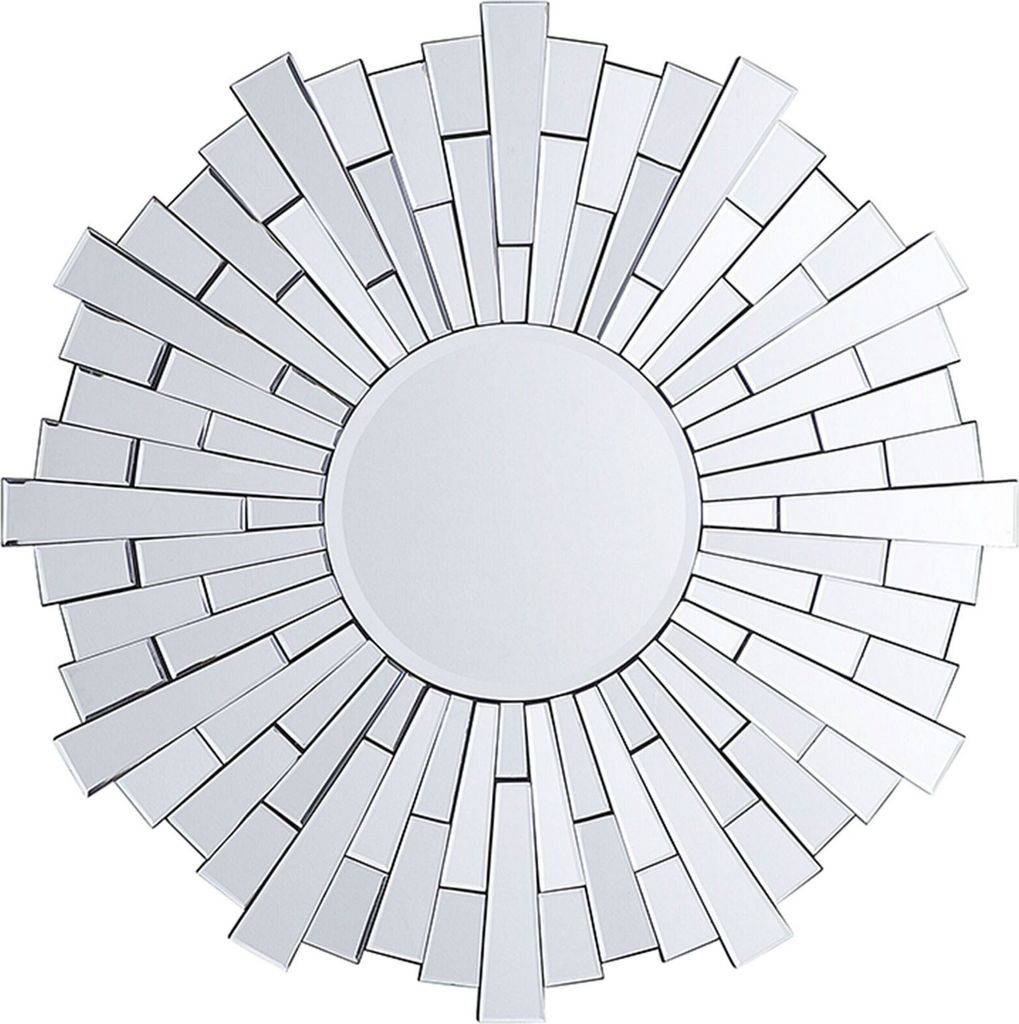 A sunburst mirror with a central circular mirror and radiating glass pieces.