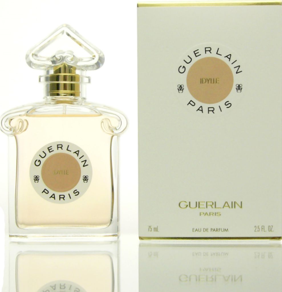 A perfume bottle and its box are displayed side-by-side against a white background.