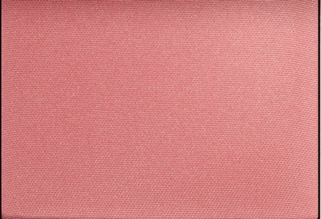 A close-up, flat lay image of a pink powder blush.
