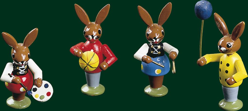 Osterdekoration Hasenkinder mit Spielzeug Höhe= 5cm NEU