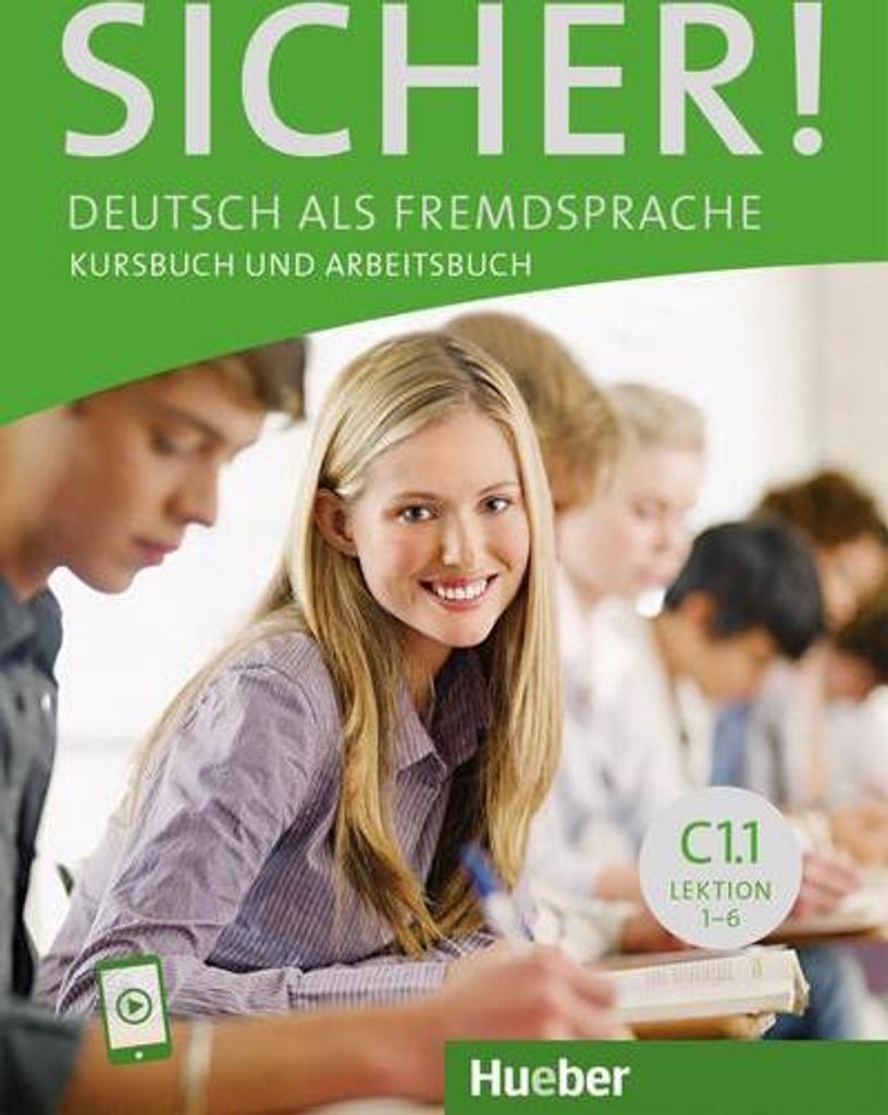 Students in a classroom setting, with a focus on a young woman smiling at the camera.