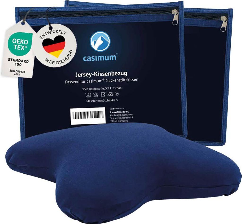 Two blue pillowcases in their packaging, with a blue pillow in the foreground.