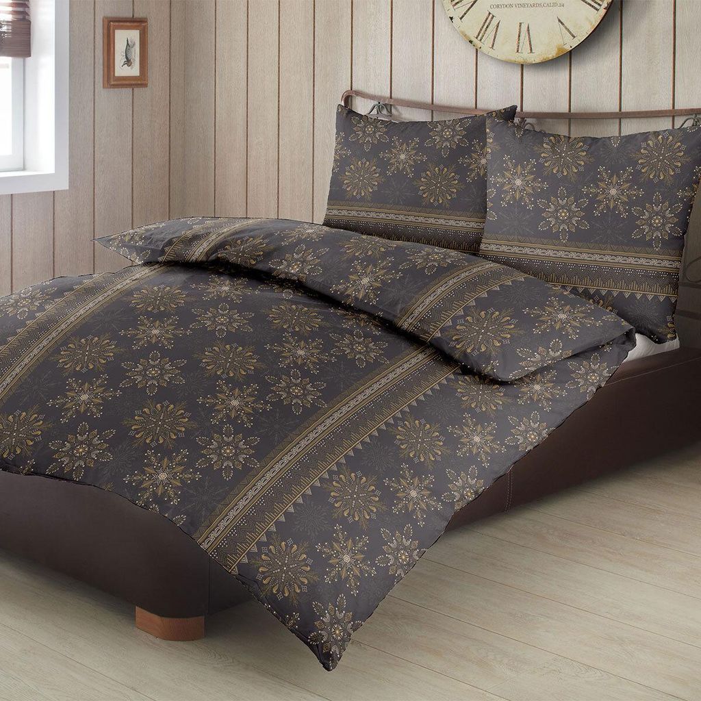Traumschlaf Feinbiber Bettwäsche Sterne und Schneeflocken schwarz 155x220 cm + 80x80 cm