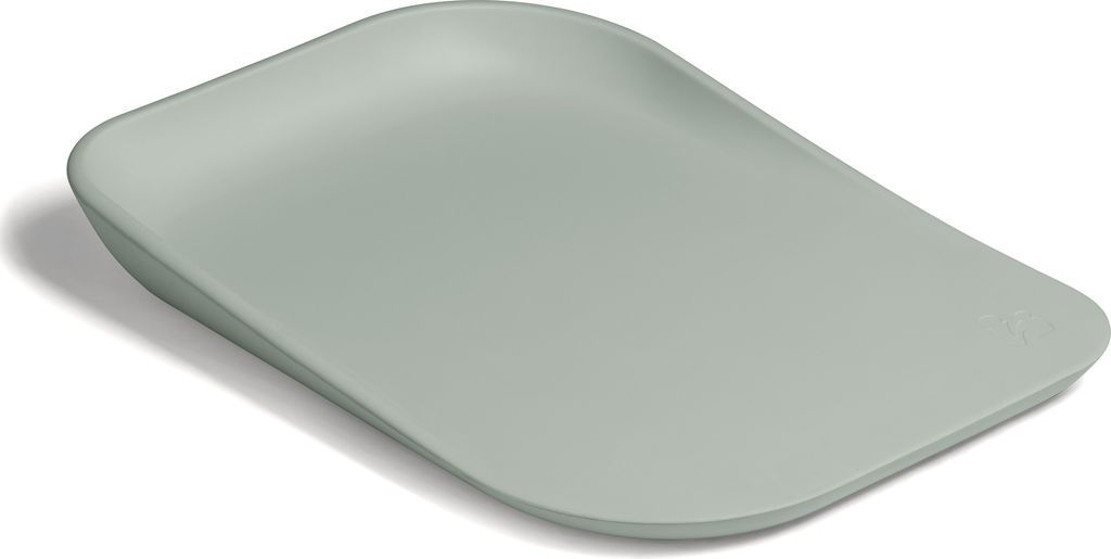 A sage-colored changing pad is shown from a diagonal angle against a white background.