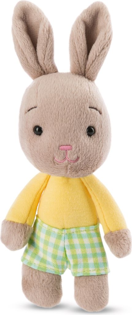 A stuffed toy rabbit standing against a white background.