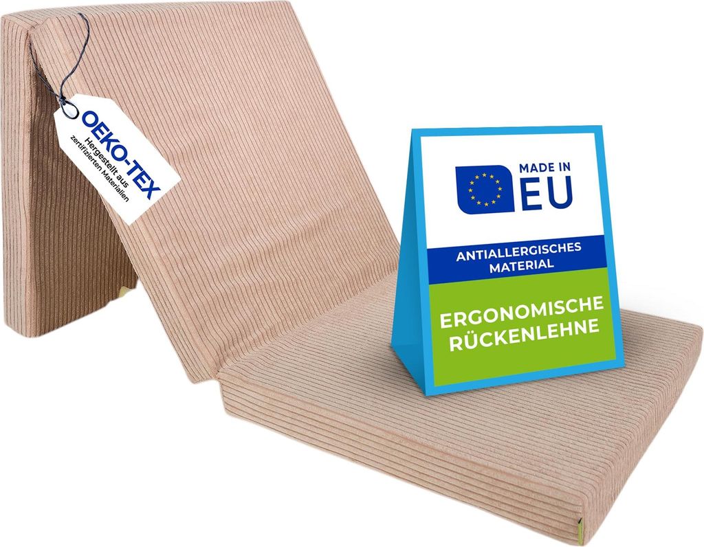 A folded mattress with informational tags and a stand-up sign.