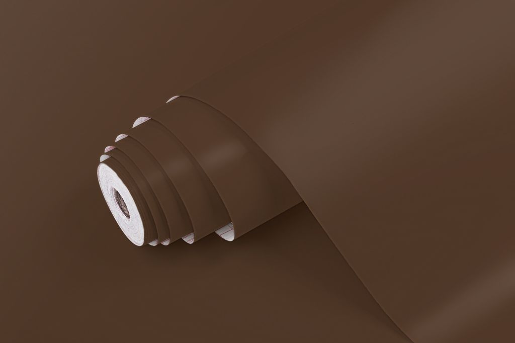 A roll of brown matte adhesive film is shown from the side, partially unrolled.