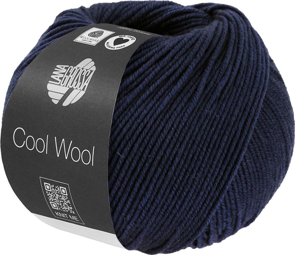 A ball of dark blue yarn with a label.