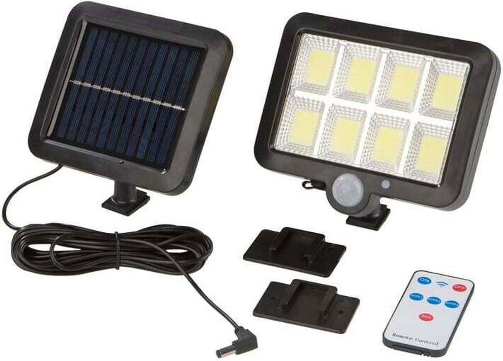 A solar-powered spotlight with a separate solar panel, remote control, and mounting brackets.
