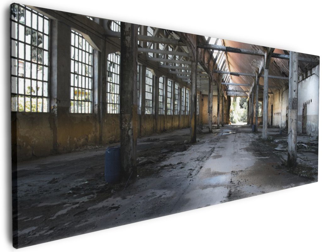 Wallario Premium Leinwandbild Alte Industriehalle leerstehend und einsam in Größe 50 x 125 cm