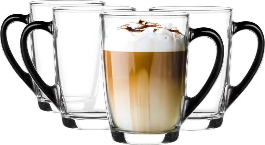 A set of four clear glass mugs with black handles, one of which is filled with a layered coffee drink topped with whipped cream and chocolate shavings.