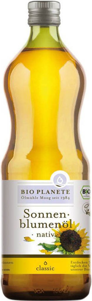 A bottle of sunflower oil on a white background.