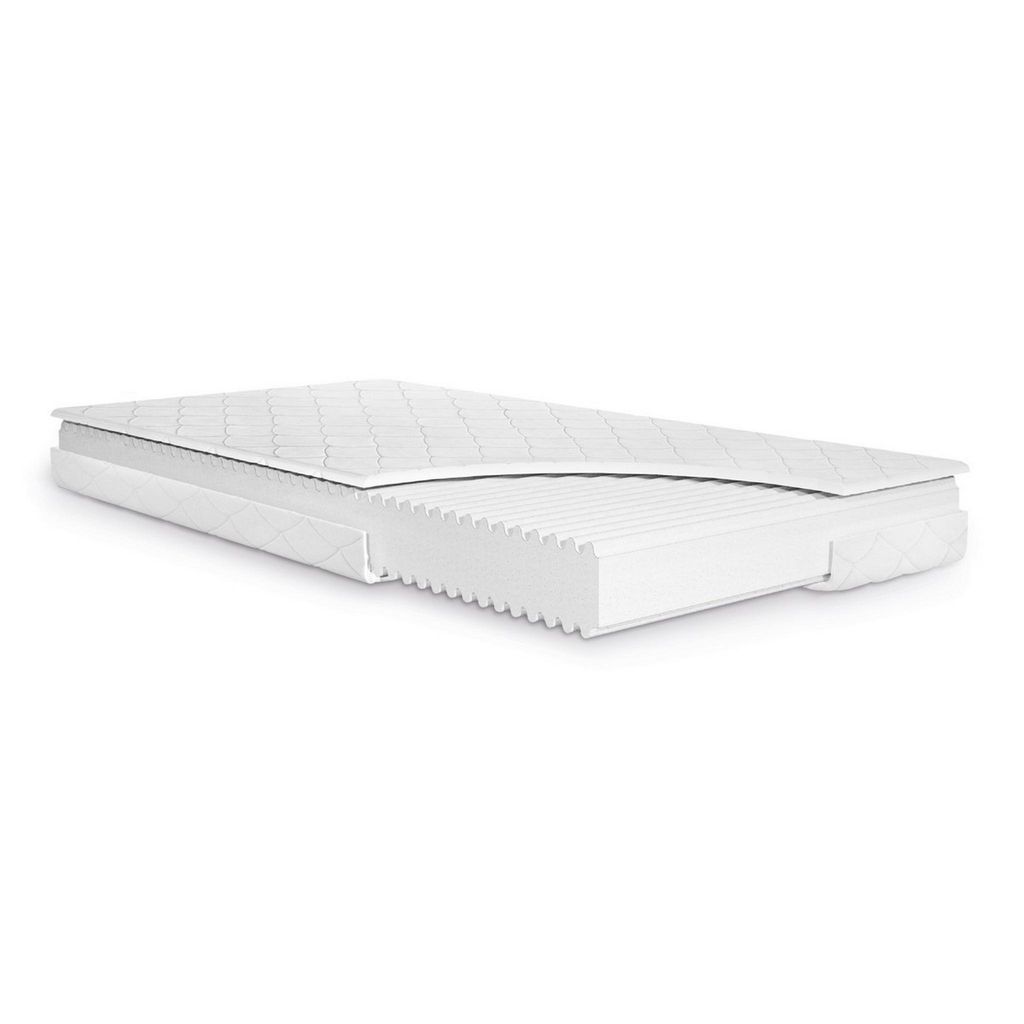 A cutaway view of a white mattress on a white background.