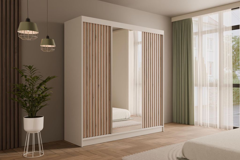 A bedroom scene featuring a white wardrobe with mirrored and slatted doors, a plant, and a window with curtains.