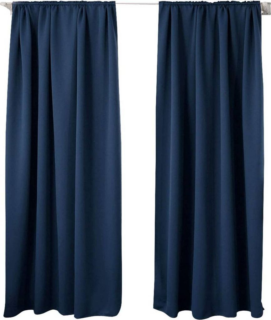 Two dark blue curtains hanging from a white curtain rod against a white background.