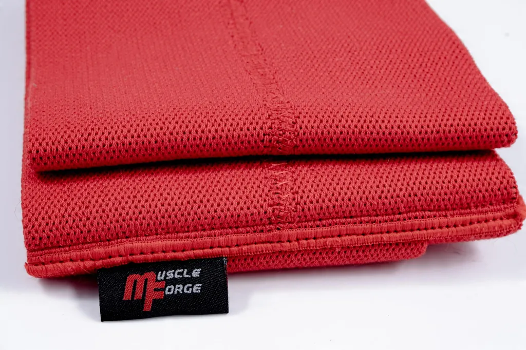 Manches de développé-couché rouges pour musculation et powerlifting