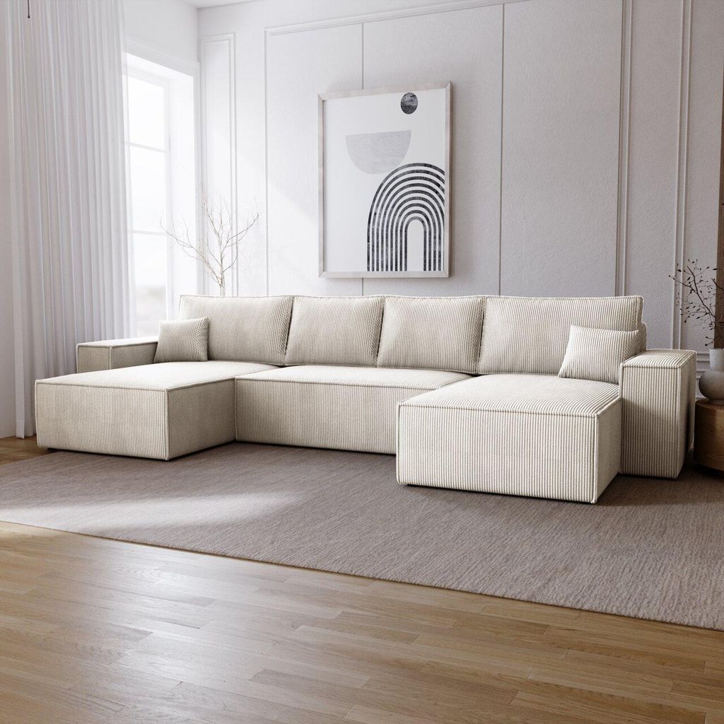 A modern living room with a large U-shaped sectional sofa.