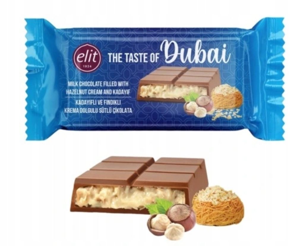 A product shot of a chocolate bar wrapper and a broken chocolate bar with ingredients.