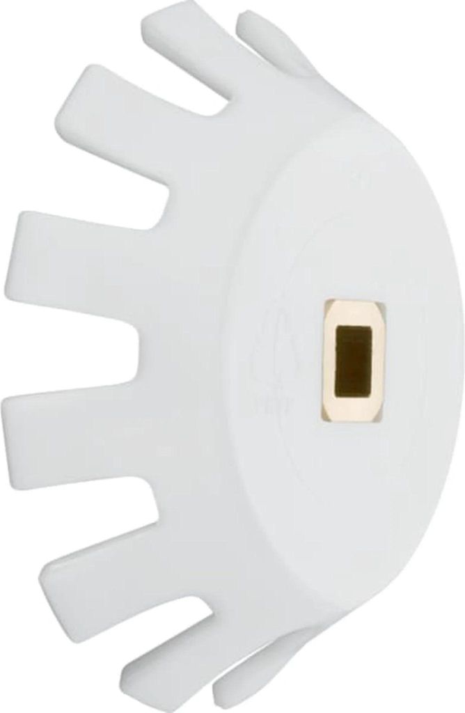A white plastic part with a gold-colored insert in the center, against a white background.