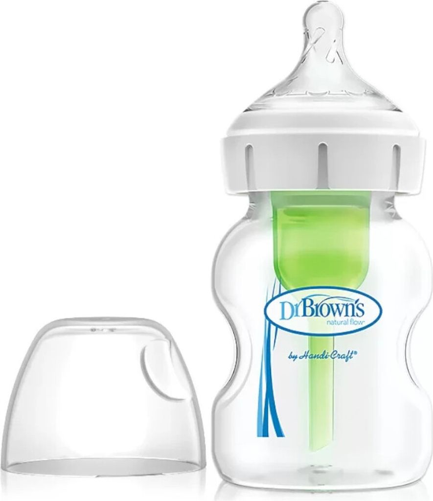 A baby bottle with its cap next to it, on a white background.