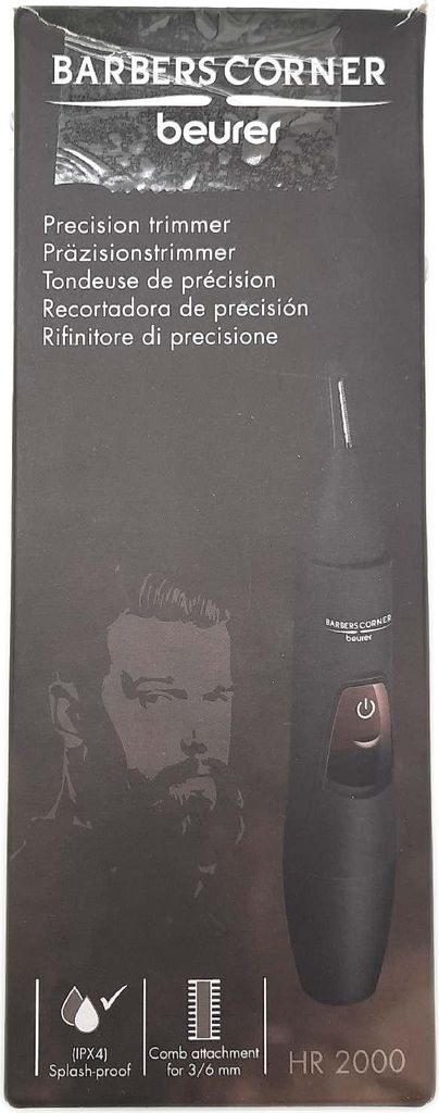 The image shows the packaging of a Beurer HR 2000 precision trimmer. The packaging features a graphic of a man's face with a beard, the product itself, and various text descriptions and icons.