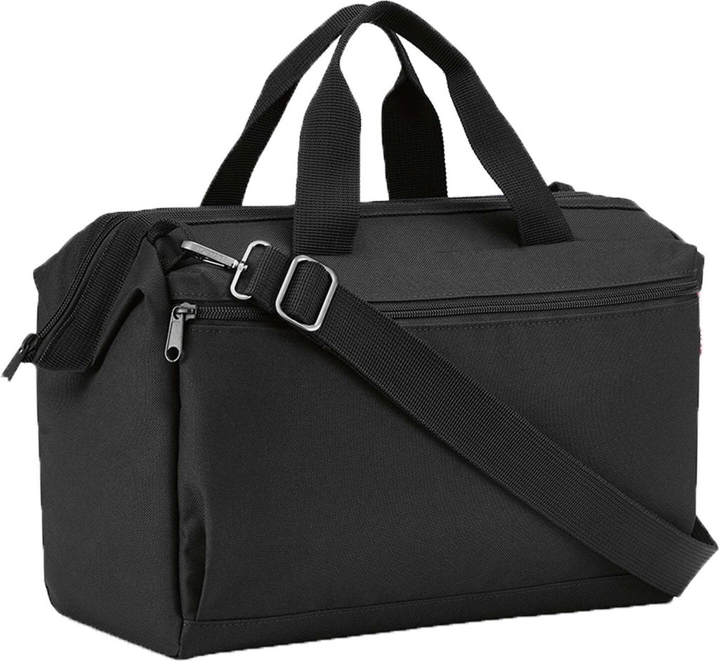 A black duffel bag with a shoulder strap and handles, shown from a side-diagonal angle.