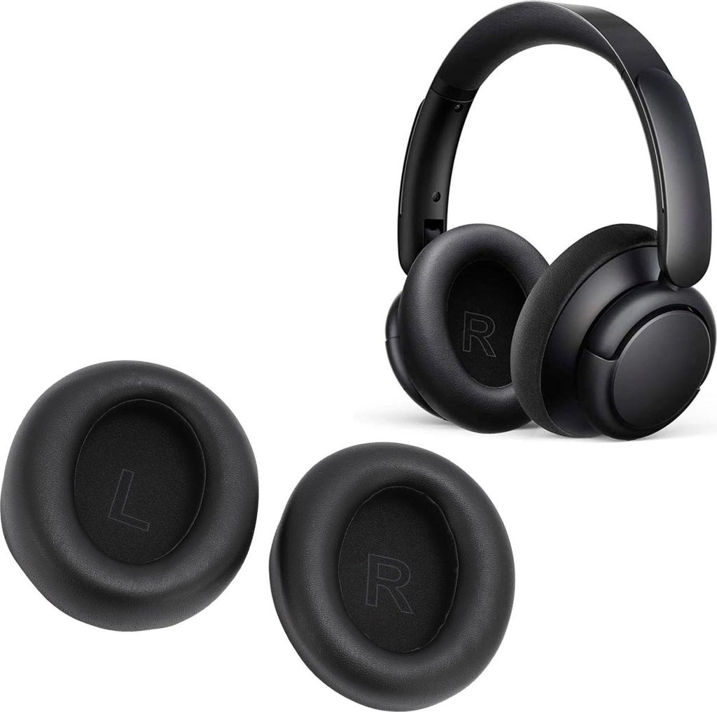 A pair of black headphones and two replacement ear pads are displayed on a white background.