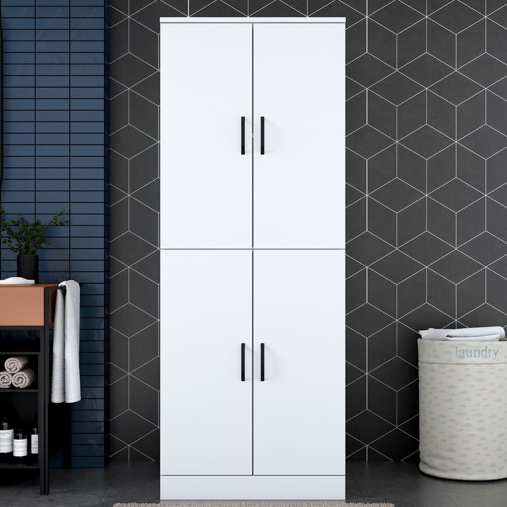 A tall, white cabinet with four doors stands in a modern bathroom setting.